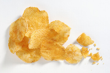 Potato chips on white