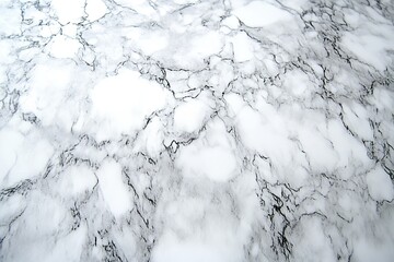 Marble-like surface with grey veins and a smooth texture