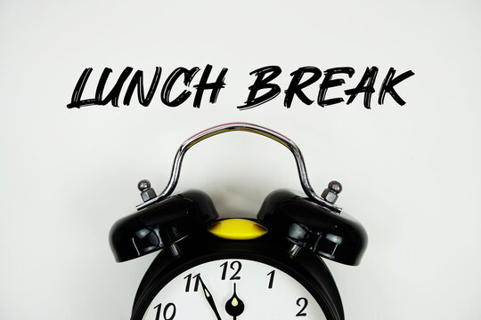 Lunch Break text with alarm clock flat lay on white background