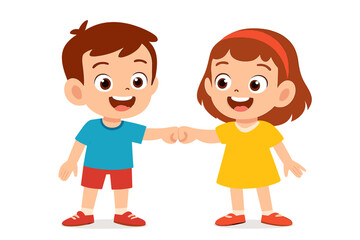 Cheerful young boy and girl performing a friendly fist bump gesture symbolizing agreement and teamwork