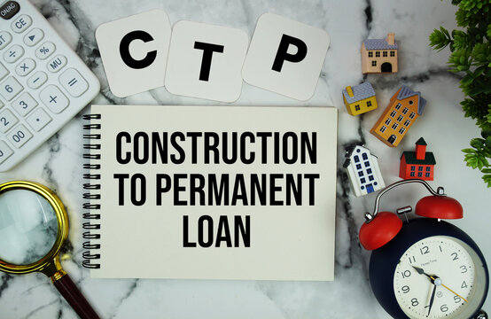 C to P Construction to Permanent Loan text written on notepad with house model, calculator, magnifying glass and alarm clock on marble background