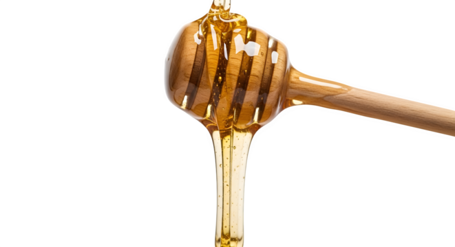 Honey dripping from dipper, isolated on transparent background