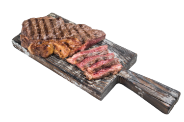 Grilled dry aged sirloin striploin New York steak sliced on rustic wooden board, juicy seared beef with rich marbling on light background.