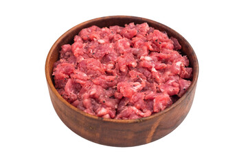 Raw chopped meat served in a wooden bowl over white surface perfect for recipe concepts culinary ads and protein rich food photography.