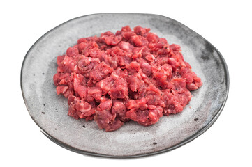 Raw chopped meat displayed on a rustic gray dish with textured concrete backdrop ideal for culinary stock images and recipe concepts.