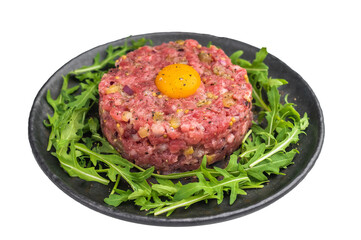 Fresh steak tartare served with mustard pickles and greens perfect for restaurant menus fine dining visuals and culinary stock content.