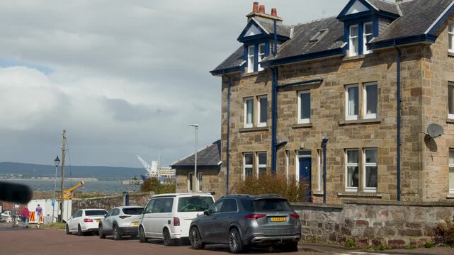 Stone House and Parked Cars on Cromarty Seaside Street