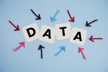 word "DATA" on cards with colorful arrows pointing toward it, highlighting the concept of information