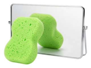 Green porous cleaning sponge reflecting in rectangular vanity mirror on a transparent background