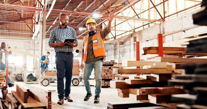 Carpentry, pointing and people on tablet in workshop for planning, construction and woodworking business. Carpenter, team and men on digital tech for online inventory for timber, lumber and meeting