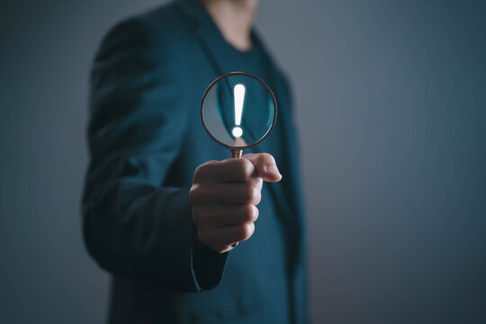 Business warning and cybersecurity alert. Risk danger and data protection concept.	