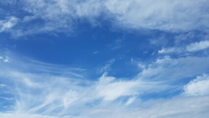 Beautiful and Vibrant Blue Sky with Wispy White Clouds A Scenic and Serene Atmosphere