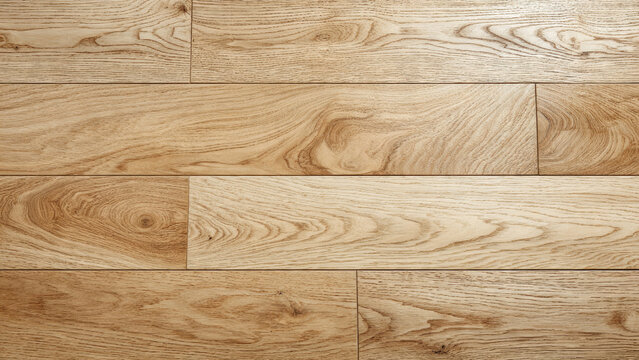 A detailed close-up of light brown wooden floorboards showcasing natural wood grain textures, ideal for home interiors and design inspiration.