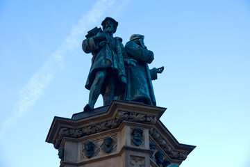 Close-up of Johannes Gutenberg memorial bronze staute at Rossmarkt at German city of Frankfurt on an autumn sunset. Photo taken November 22nd, 2025, Frankfurt am Main, Germany.
