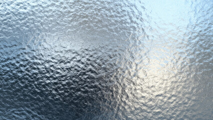 A close-up of a highly textured, reflective silver or metallic surface with ripples and creases, creating a dynamic, abstract pattern.