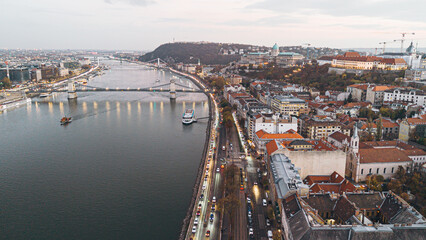 Aerial view of Budapest, Hungary featuring the Danube river, bridges, and iconic architecture.