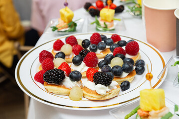Fresh fruit topped mini pancakes