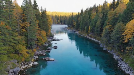 Beautiful autumn landscape reflection of colorful forest trees in a tranquil blue lake water - Powered by Adobe