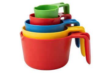 Set of stacked bright colorful plastic measuring cups for kitchen use on a transparent background
