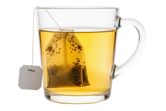 Clear glass mug with hot yellow herbal tea and brewing bag on a transparent background
