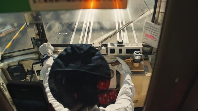 Train conductor driving on a japanese railway