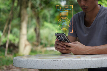 Modern Man Using Smartphone for Internet of Things on Farm