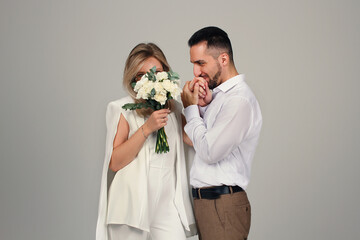 A wedding portrait of the newlyweds. Portrait of a guy and a girl in love	