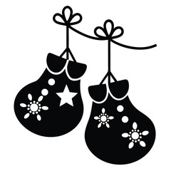 Stylized winter mittens are hanging on a decorative string, in black and white
