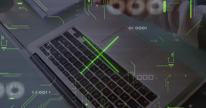 Typing hands using laptop keyboard and trackpad at work desk, striped sleeve, neon overlay, pen