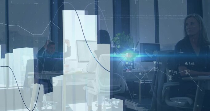 Sitting adult female analyst wearing light top typing at monitor in office, showing data overlays