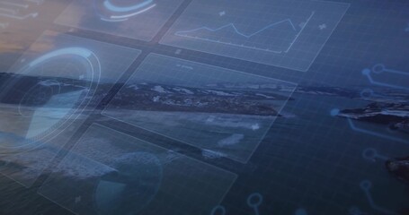 Displaying aerial coastal seascape blending light HUD elements data panels grid over ocean rocks