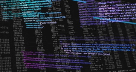 Displaying central source code and error log table at dev desk, with flat-panel monitors