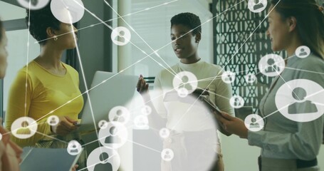 Speaking centered woman in business casual holding tablet, gesturing in office with digital overlay