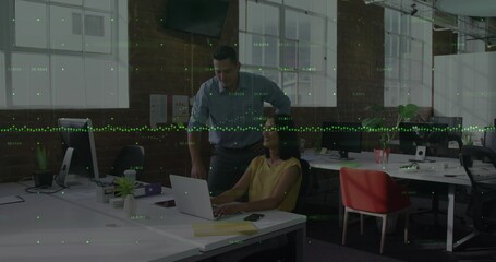 Leaning man in button-down and woman in sleeveless top checking laptop in open office, data overlay