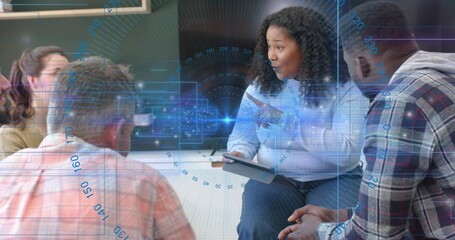 Gesturing woman lead in sweater and jeans holding tablet and pointing in office space, HUD graphics