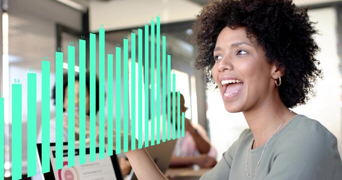 Presenting woman in light green top and hoop earrings gesturing in office, laptop, teal overlay