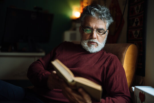 Reading a book in a cozy chair