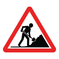 Roadworks warning sign with silhouette of construction worker digging