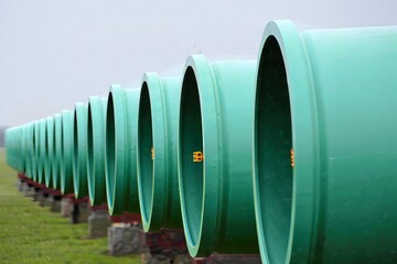 Stacked Green Pipes - Construction Materials, Infrastructure Project