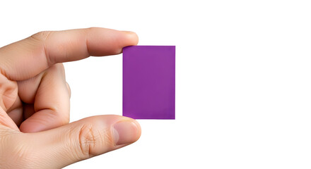 Human hand carefully holding a small, vibrant purple rectangular block against a clean white background, showcasing precision and a simple geometric form with potential