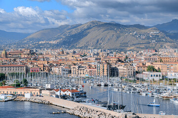 Palermo cityscape: sea view of the La Cala marina and glimpses of the historic district in Sicily, southern Italy.