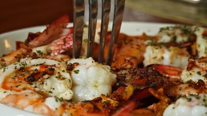 Fried shrimp and garlic with parsley.