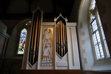 Ornate Pipe Organ and Stained Glass Windows in St. Peter and St. Paul Church, West Wittering...