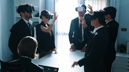 Professional project manager working on laptop and sending data analysis to business people by using VR glass with hologram of financial data analysis or holographic software development. Directorate. - Powered by Adobe