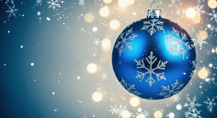 Blue Christmas ornament with snowflake design hangs against a blurred background of soft lights and falling snowflakes, creating a festive winter atmosphere with copy space