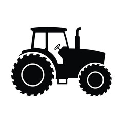 Black silhouette of a farm tractor with large wheels