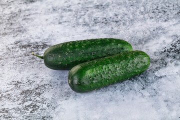 Ripe green raw two cucumbers