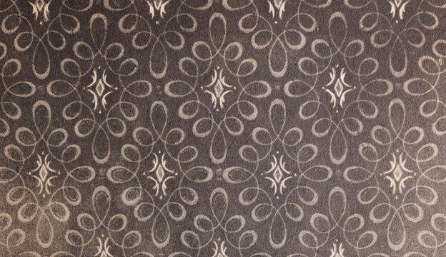 Old wallpaper on the wall. Old wallpaper for texture or background.