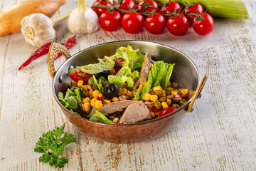 Dietary salad with canned tuna and corn
