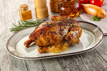 Baked in oven whole chicken with spices